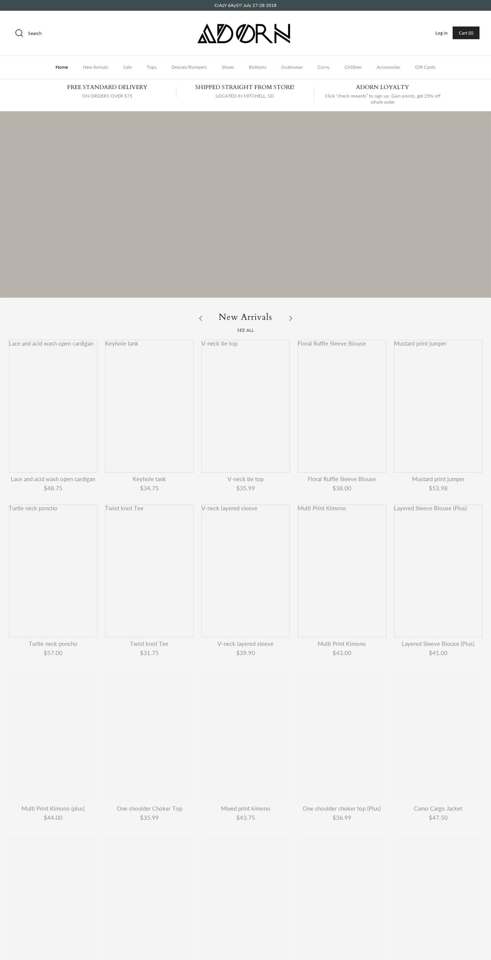 adornboutiquemitchell.com — Shopify storefront screenshot