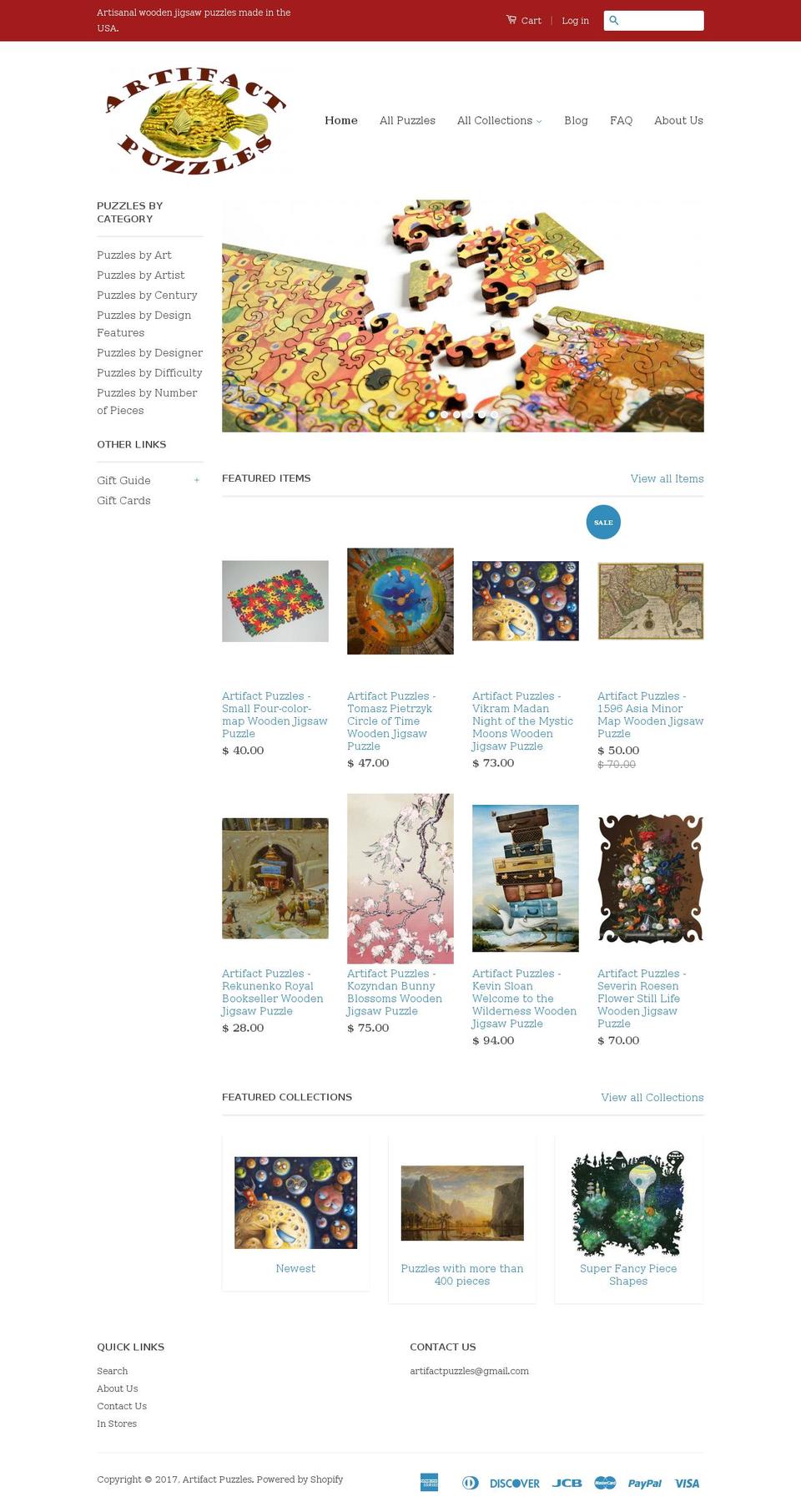 artifactpuzzles.net shopify website screenshot