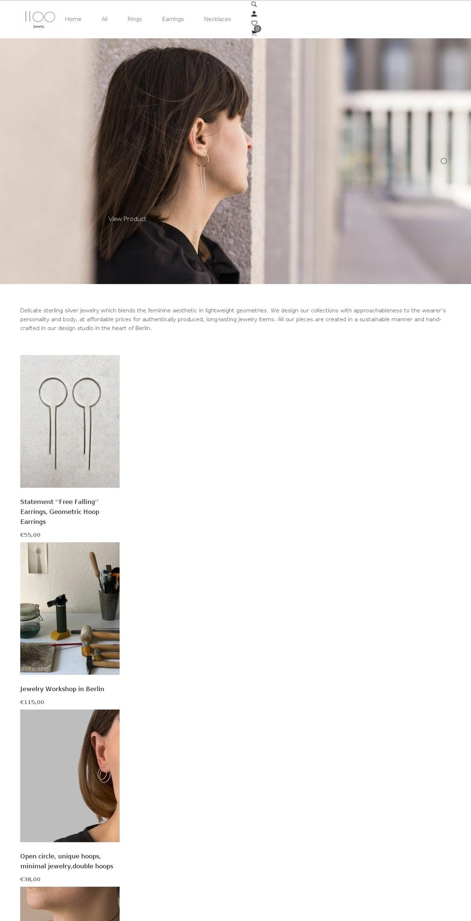 Lezada Shopify theme site example iioo.jewelry