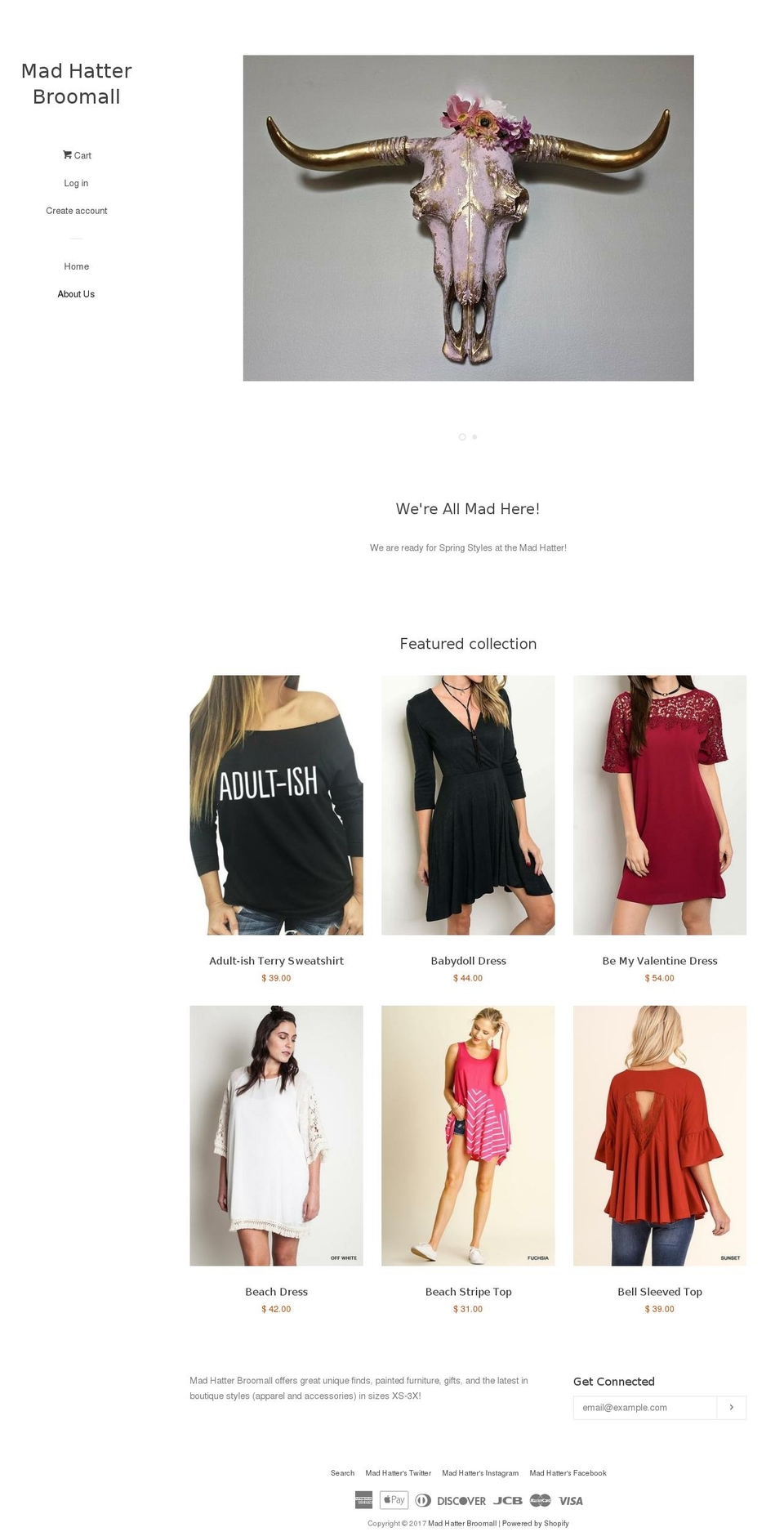 madhatterbroomall.com shopify website screenshot