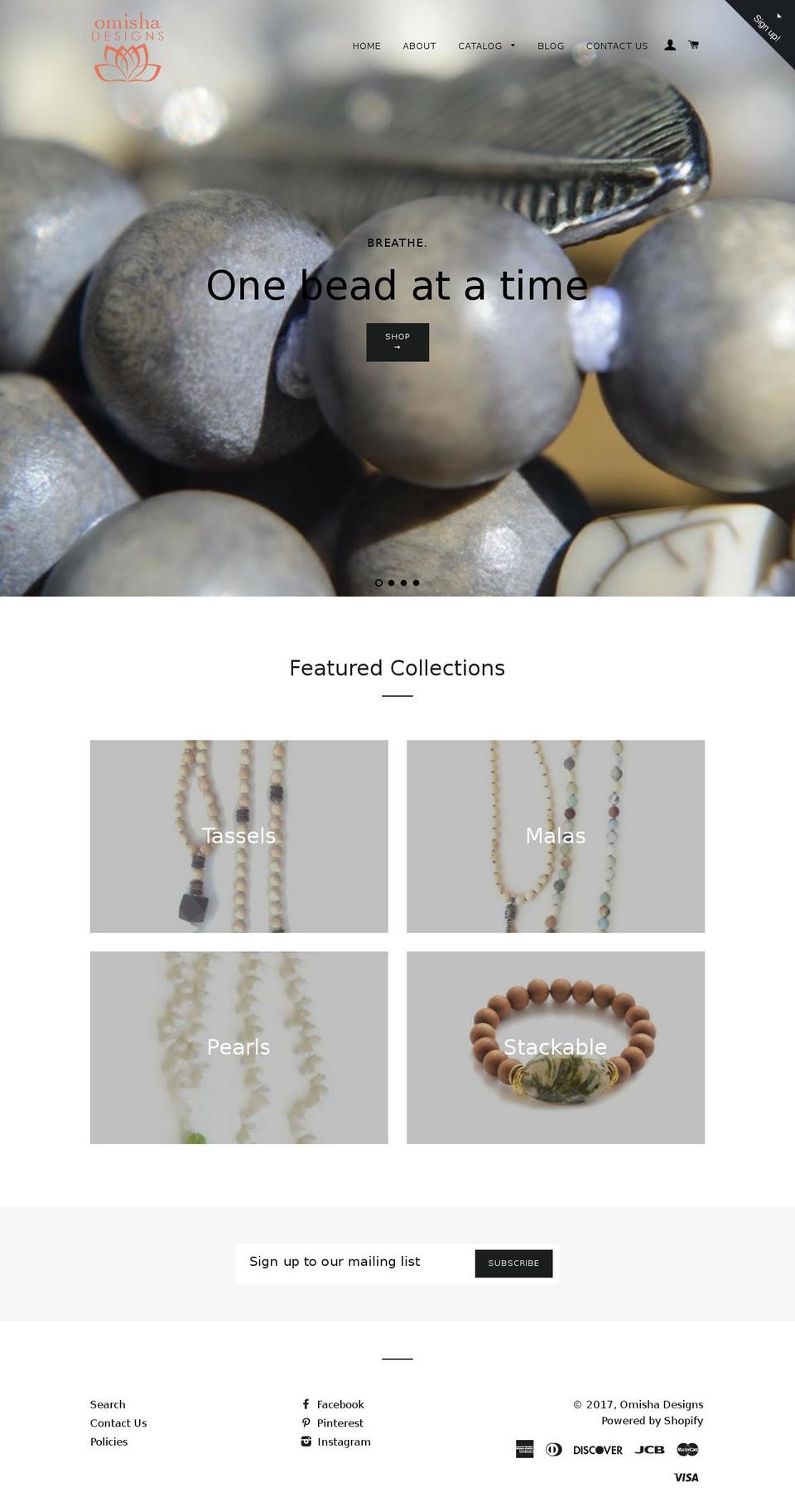 omishadesigns.com shopify website screenshot