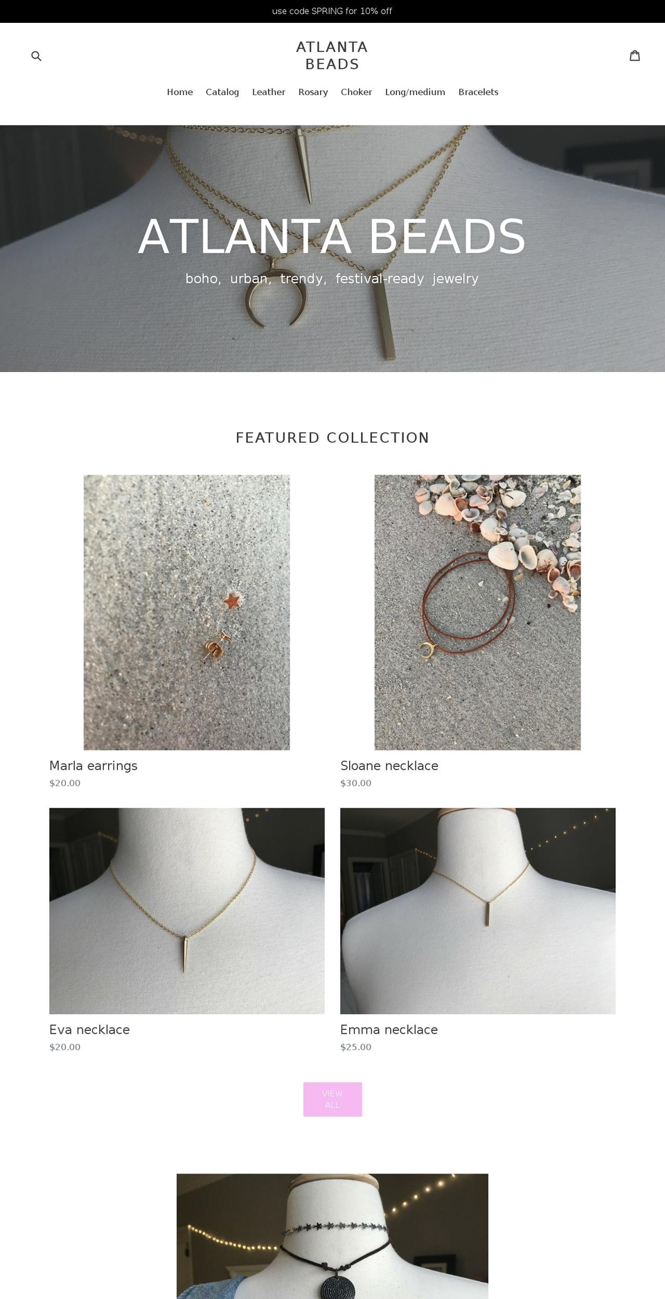 tevdesigns.net shopify website screenshot