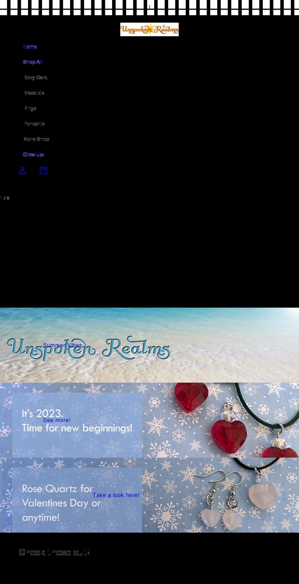 unspokenrealms.com shopify website screenshot