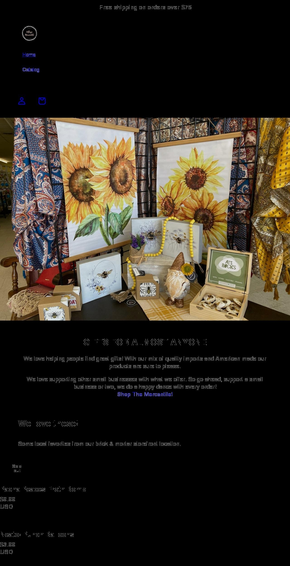 villagemercantilegifts.com shopify website screenshot